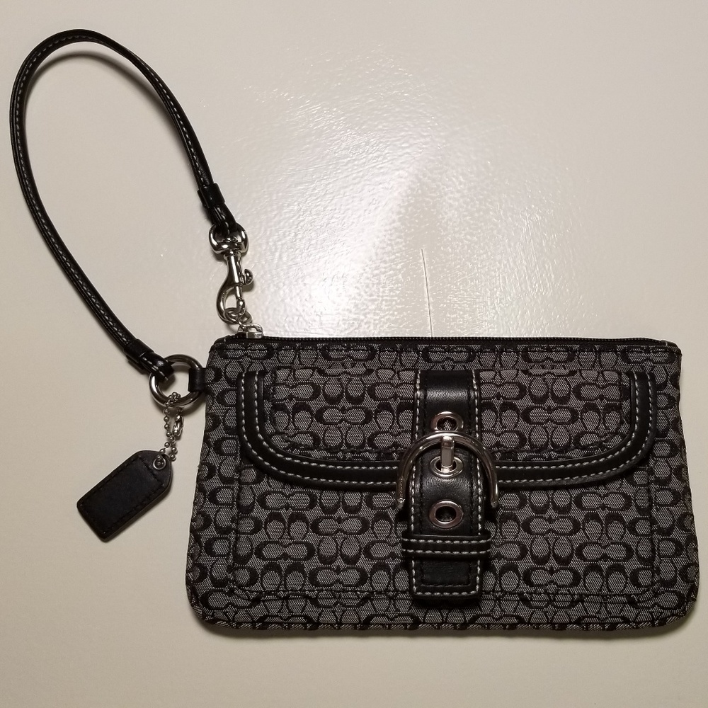 Black coach wristlet. Excellent condition!